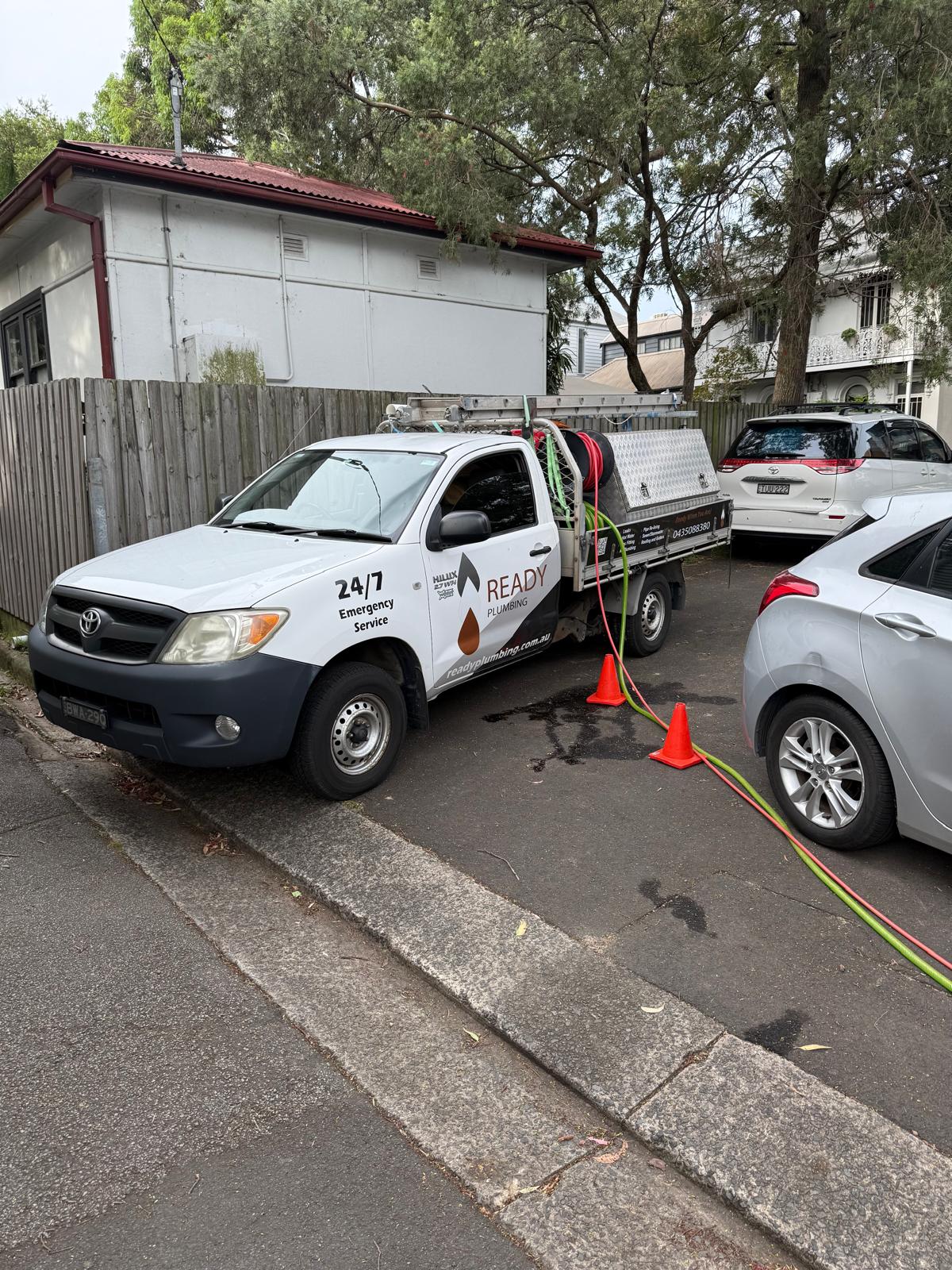 Ready Plumbing branded ute on site with jetter hoses ready for an emergency call-out