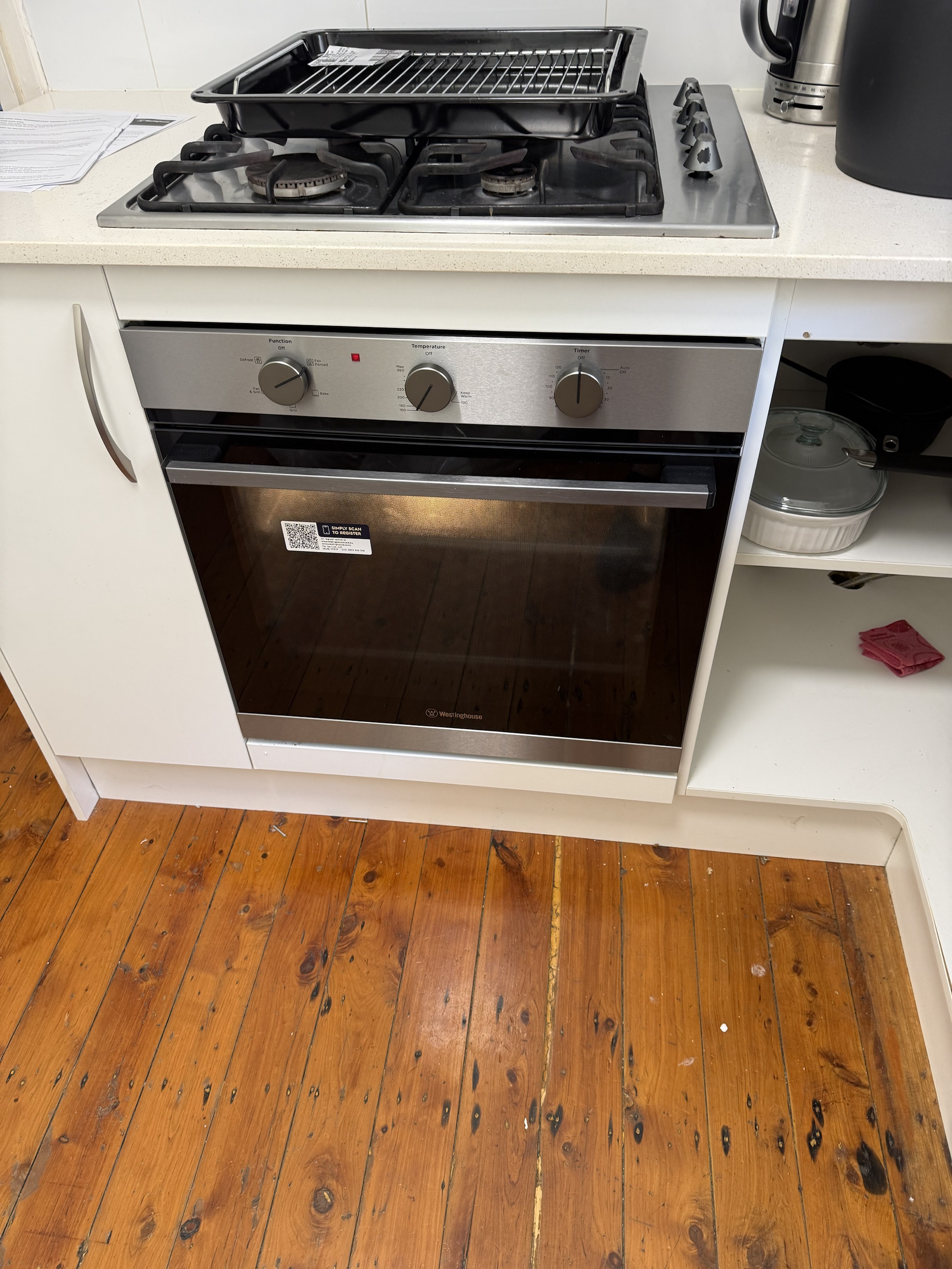New Westinghouse gas oven installed and connected under the cooktop in Fairlight
