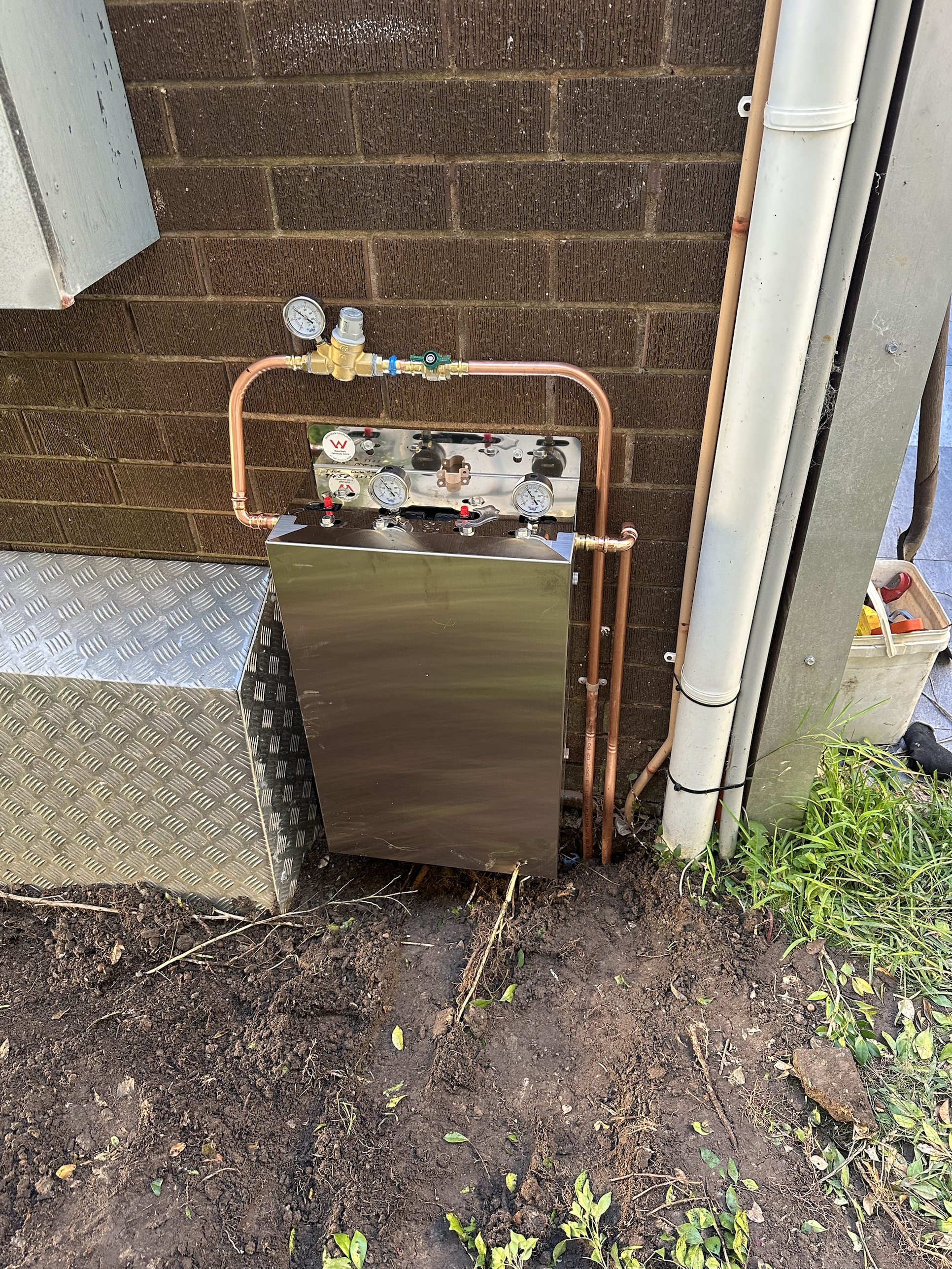 The same whole house water filtration system enclosed in its stainless housing once the install was finished